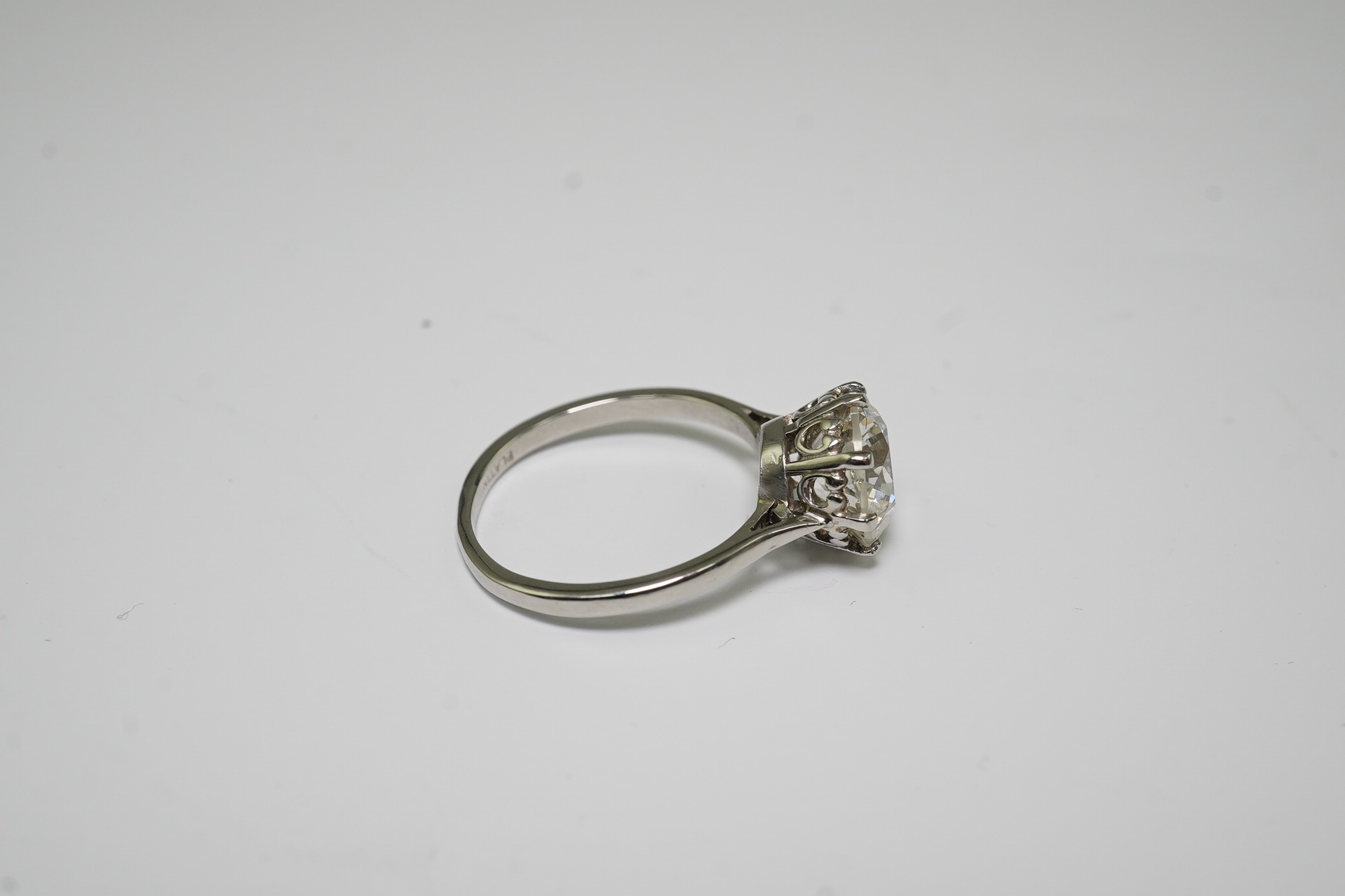 A platinum and solitaire diamond set ring